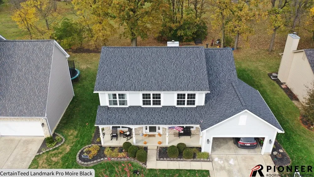 Slide of Pioneer Roofing & Restoration