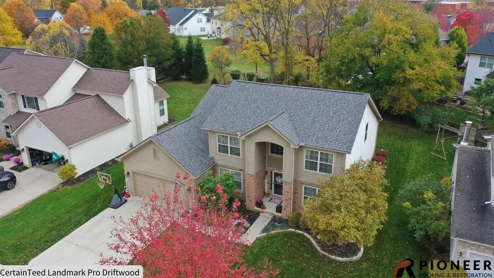 Slide of Pioneer Roofing & Restoration