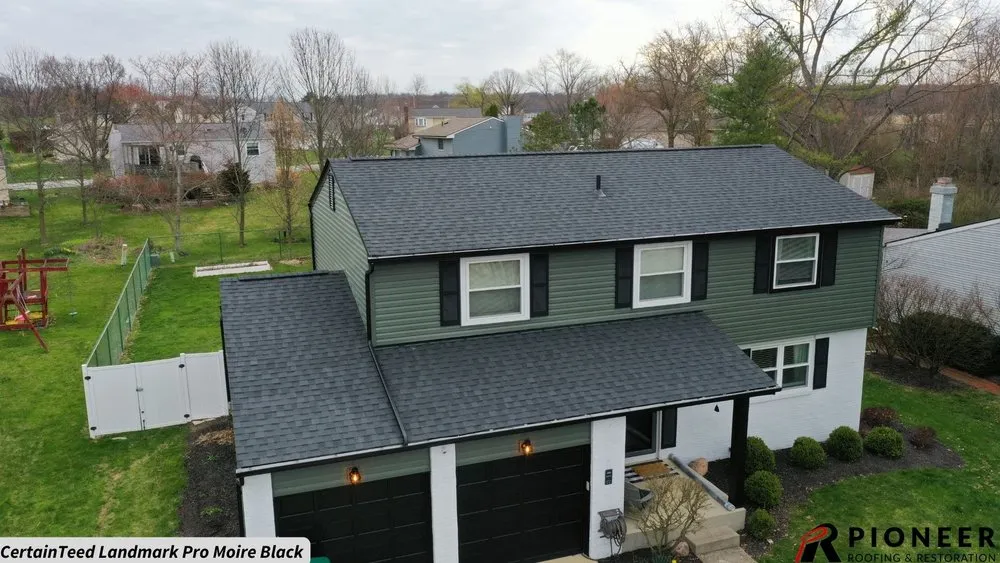 Slide of Pioneer Roofing & Restoration