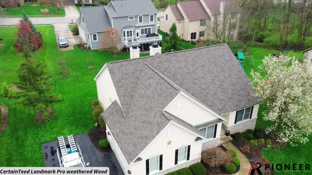 Slide of Pioneer Roofing & Restoration