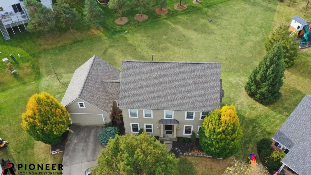 Slide of Pioneer Roofing & Restoration