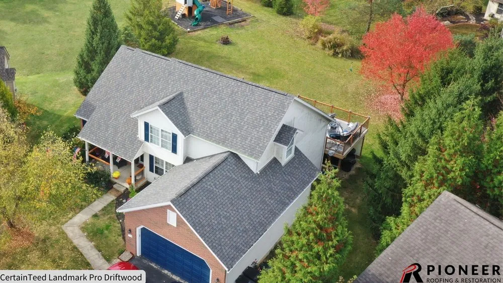 Slide of Pioneer Roofing & Restoration