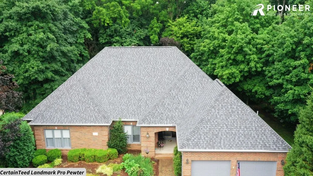 Slide of Pioneer Roofing & Restoration