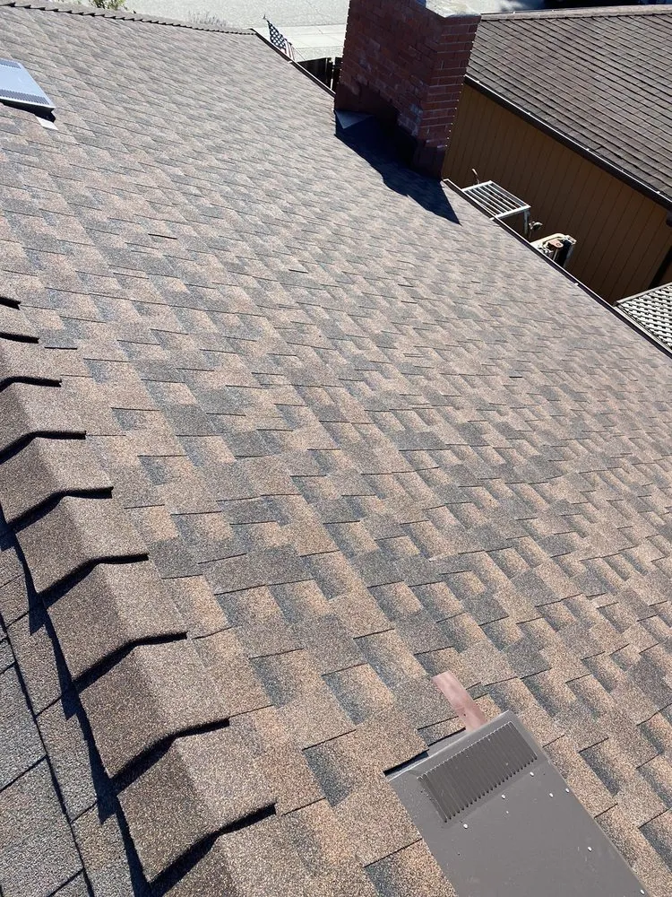 Slide of Pio’s  Roofing                