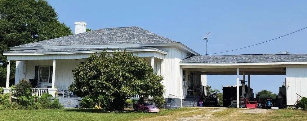 Slide of Pitch Black Roofing