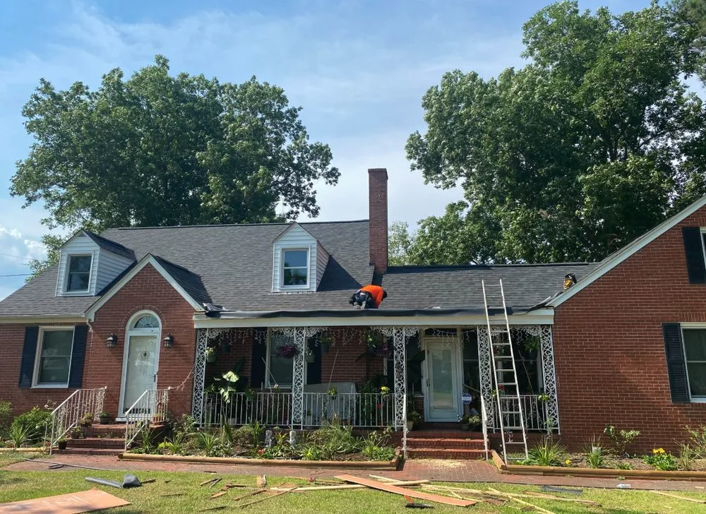 Slide of Pitch Black Roofing