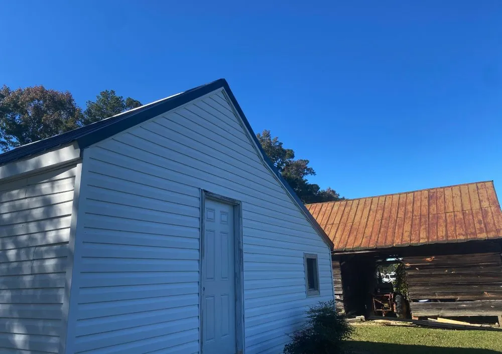 Slide of Pitch Black Roofing