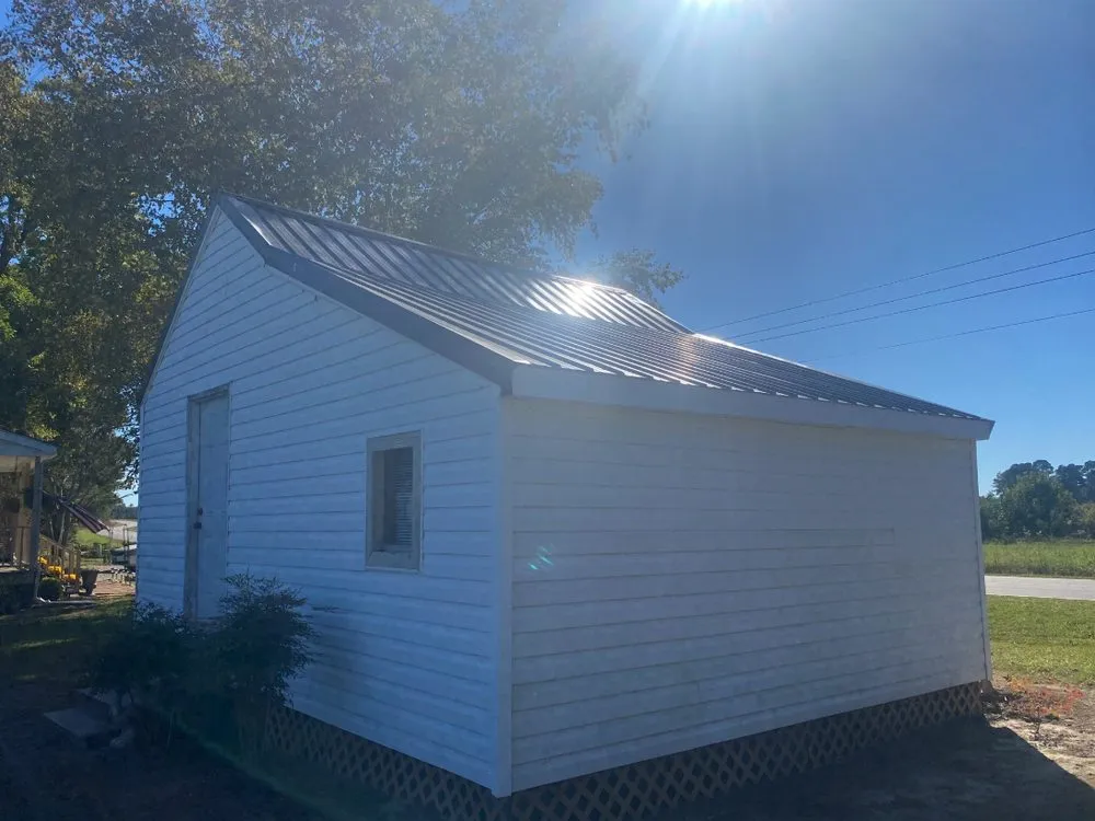 Slide of Pitch Black Roofing