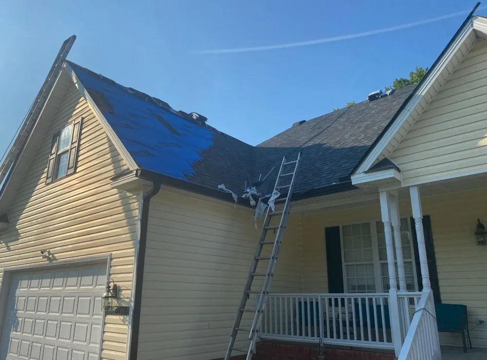 Slide of Pitch Black Roofing