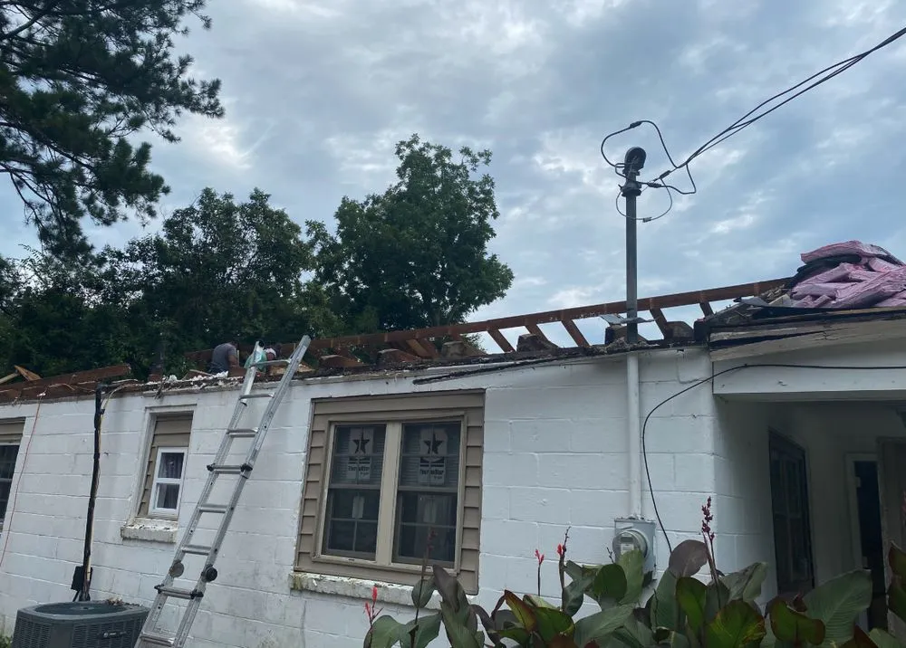 Slide of Pitch Black Roofing