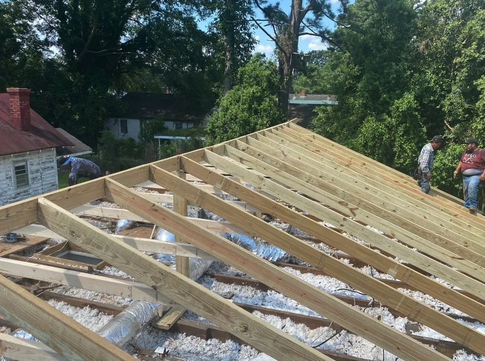 Slide of Pitch Black Roofing