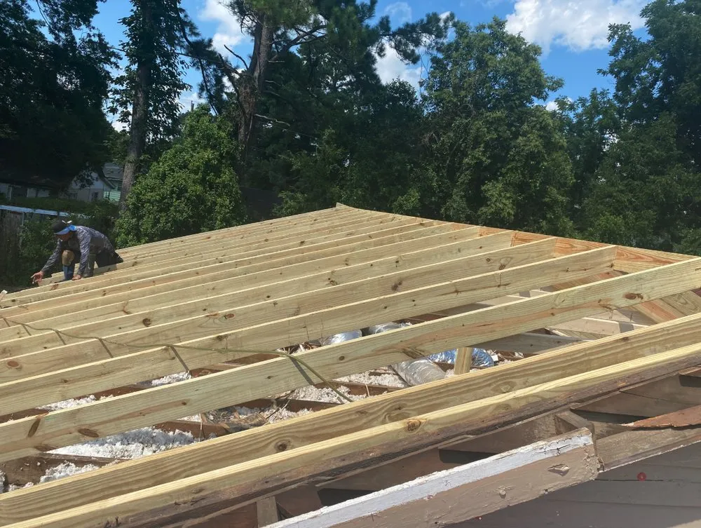 Slide of Pitch Black Roofing