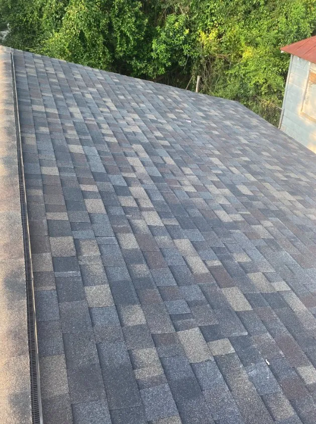 Slide of Pitch Black Roofing