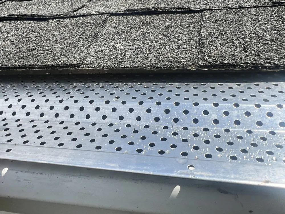 Slide of Pitch Perfect Roofing Gutter & Pressure Wash Services