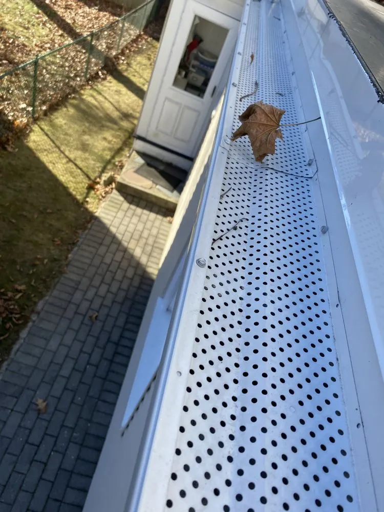 Slide of Pitch Perfect Roofing Gutter & Pressure Wash Services