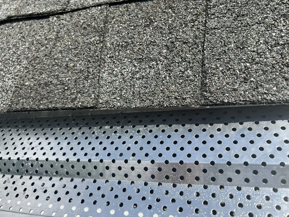 Slide of Pitch Perfect Roofing Gutter & Pressure Wash Services