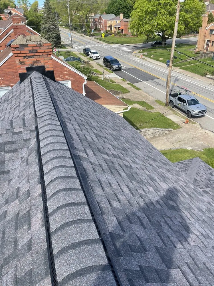 Slide of Pitt Roofing