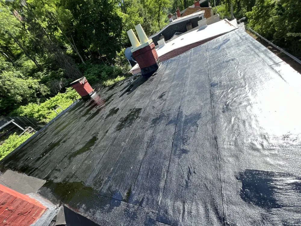 Slide of Pittsburgh #1 Roofer