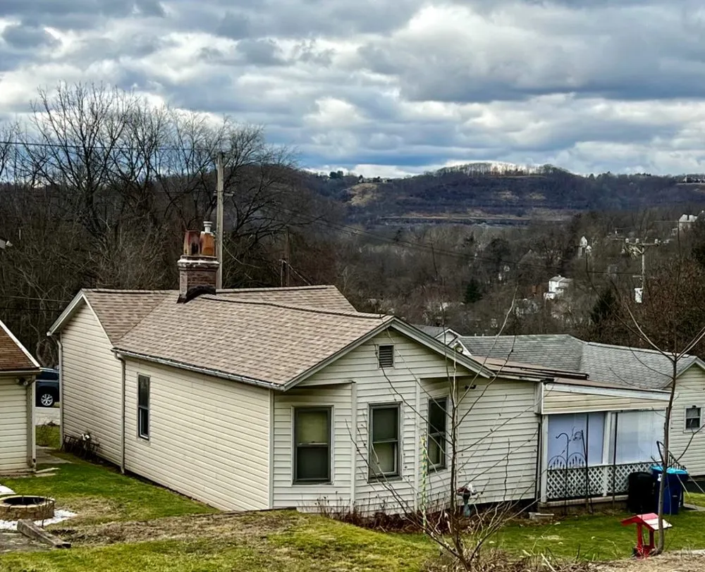 Slide of Pittsburgh Precision Contracting