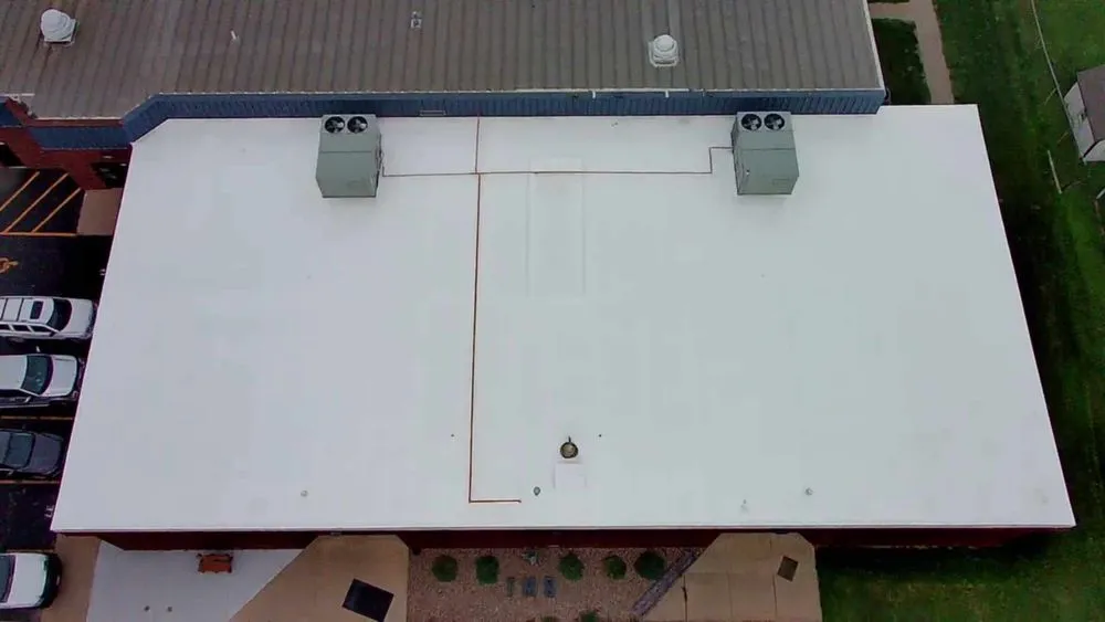 Emergency storm damage roof repair same-day service in Ridgeway, MO by Planks Roofing and Coating