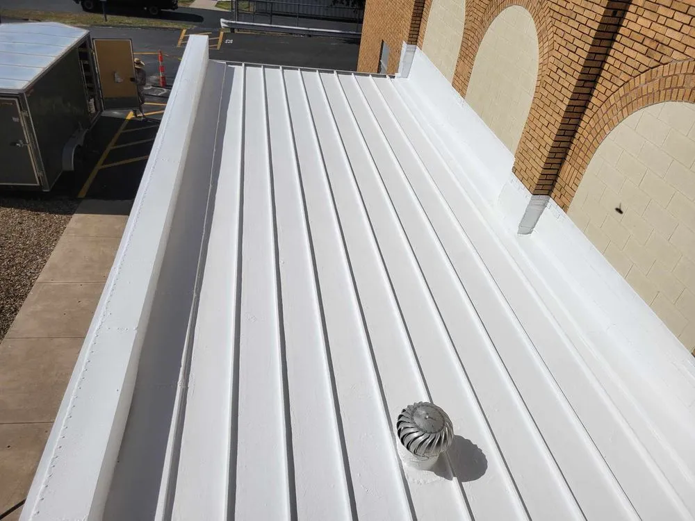 Professional flat roof repair in Ridgeway, MO by Planks Roofing and Coating