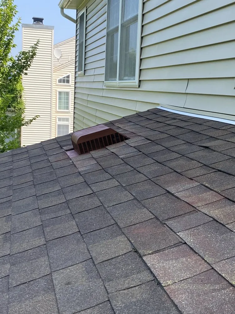 Slide of Platinum Roofing and Construction