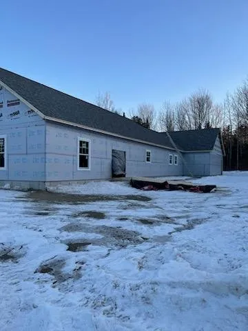 Slide of Plourdes Roofing