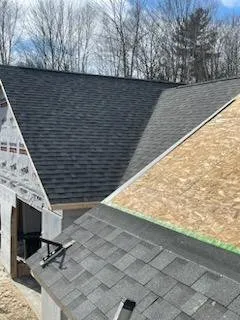 Slide of Plourdes Roofing