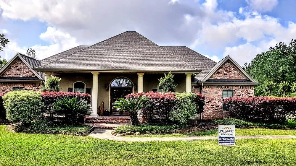 Slide of Plunkett Roofing