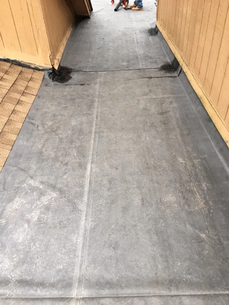 Slide of P&M Roofing