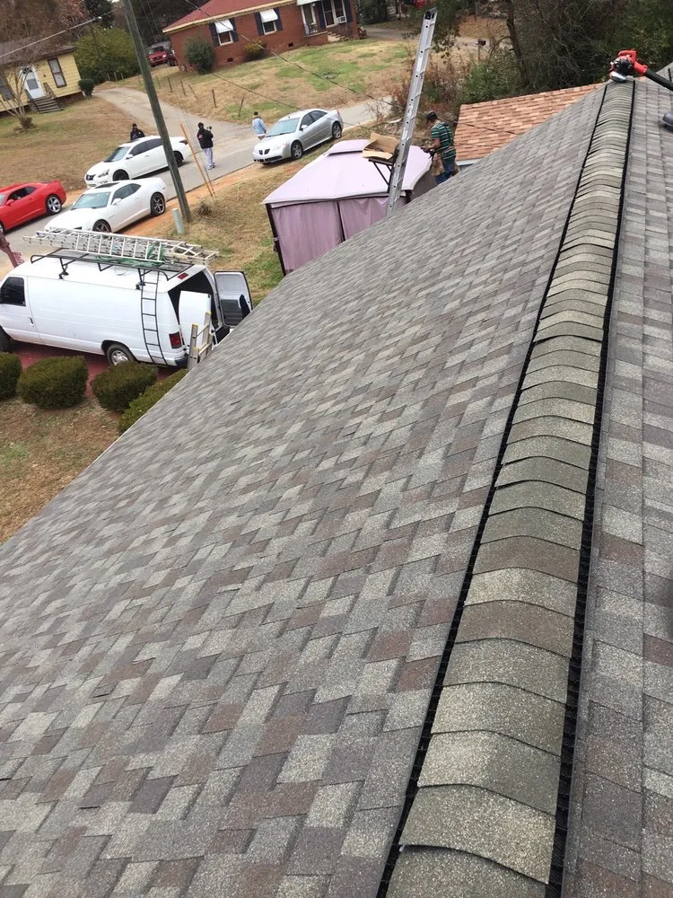 Slide of P&M Roofing