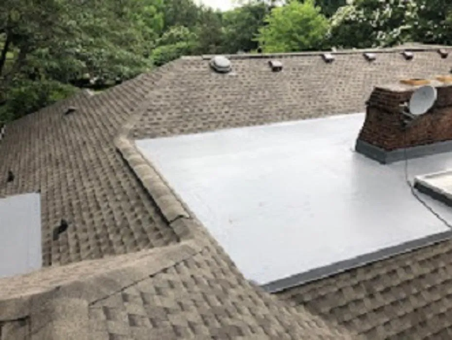 Slide of PMI Roofing & Renovations