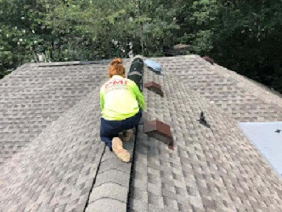 Slide of PMI Roofing & Renovations