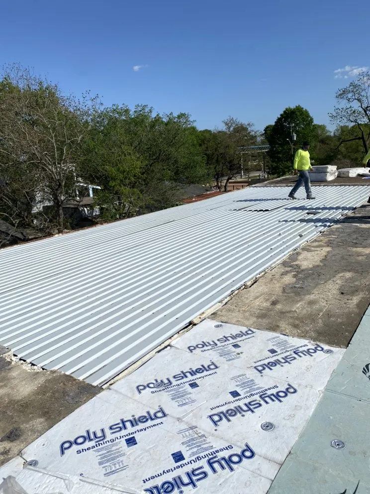 Slide of PNP ROOFING