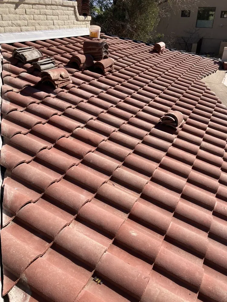 Slide of Poblete Roofing