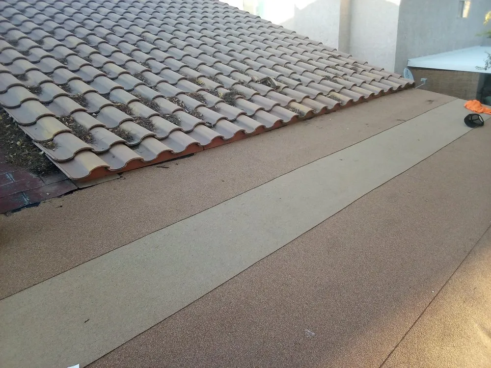 Slide of Pollitos Roofing