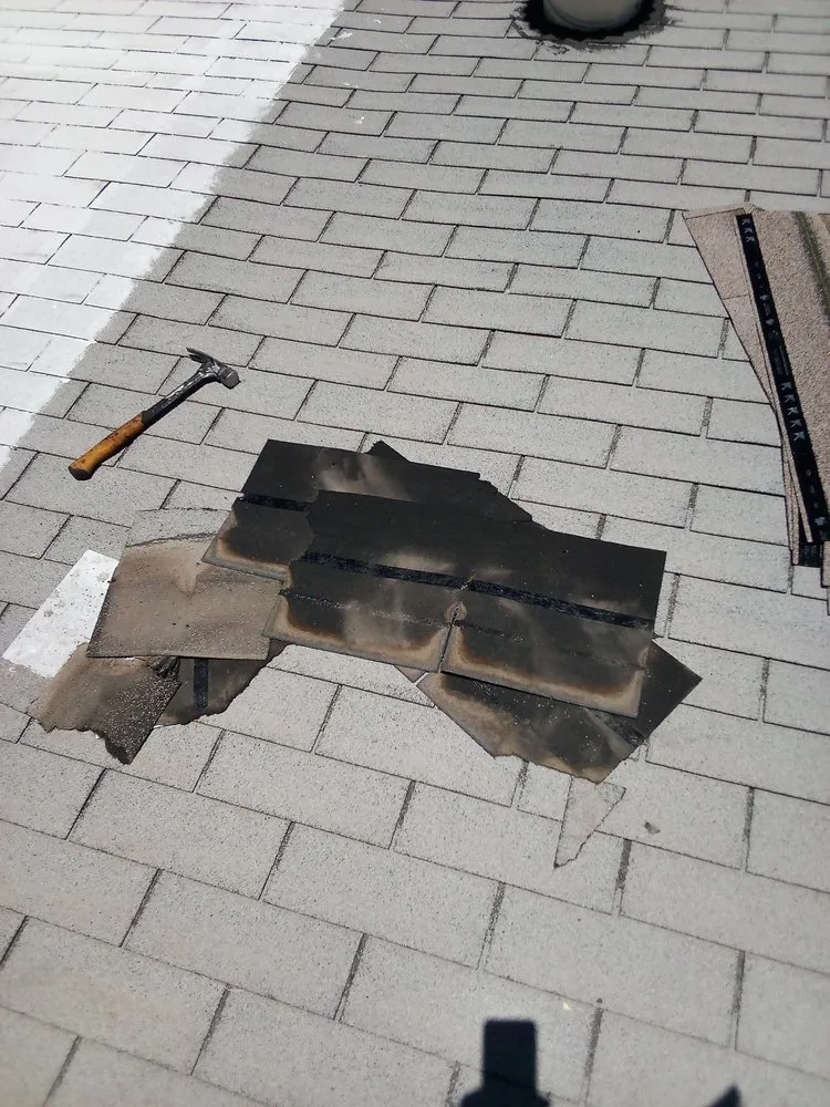 Slide of Pollitos Roofing