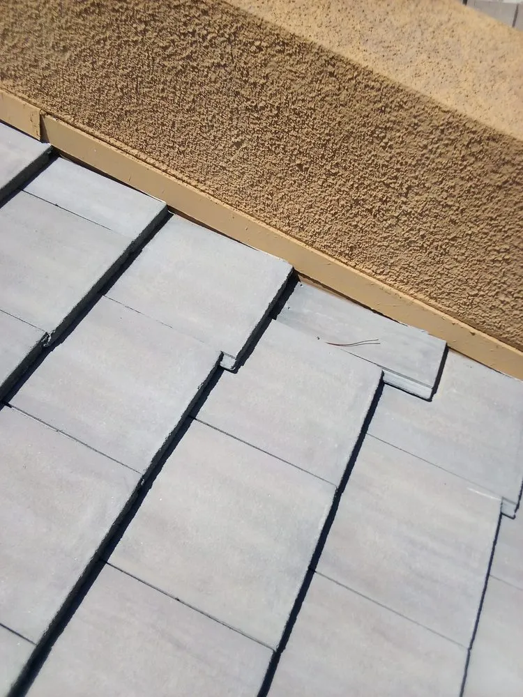 Slide of Pollitos Roofing