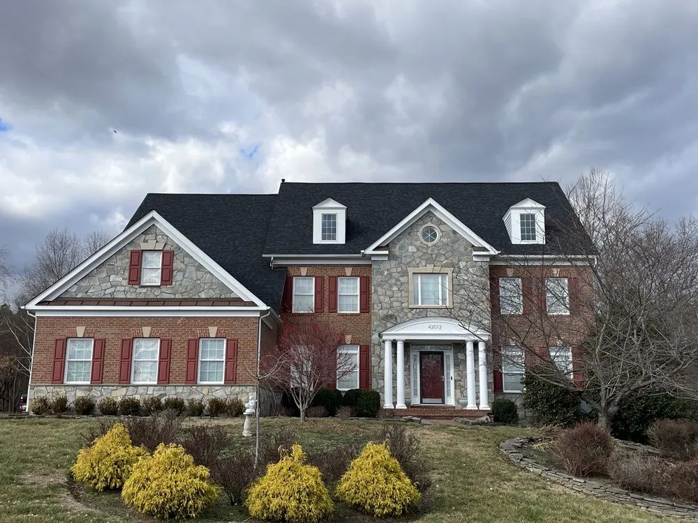 Slide of Pond Roofing Company