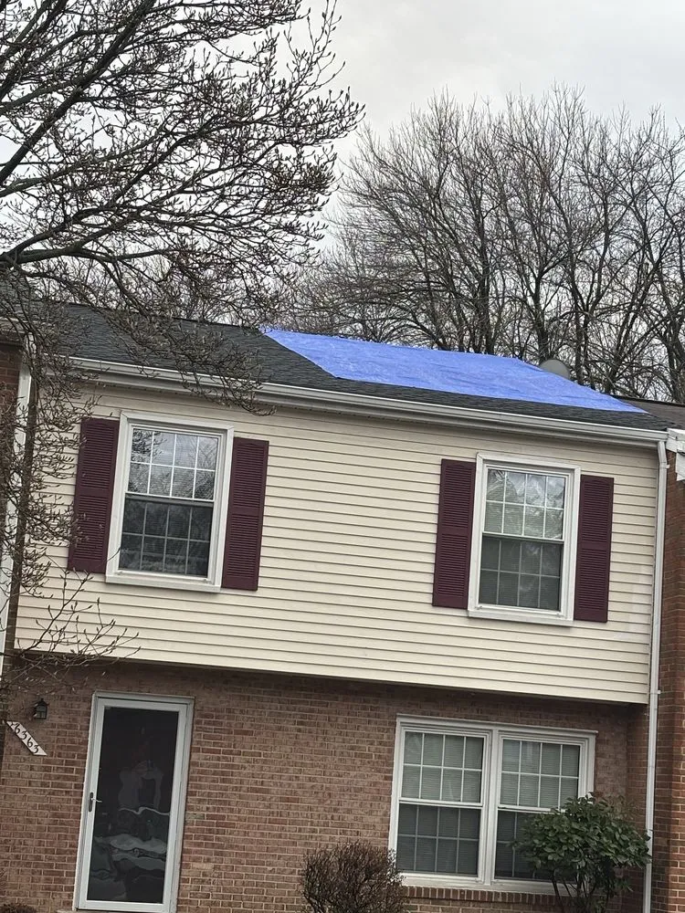 Slide of Pond Roofing Company