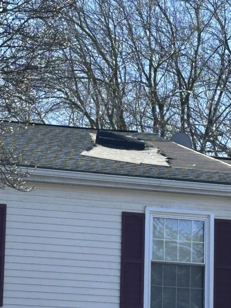 Slide of Pond Roofing Company