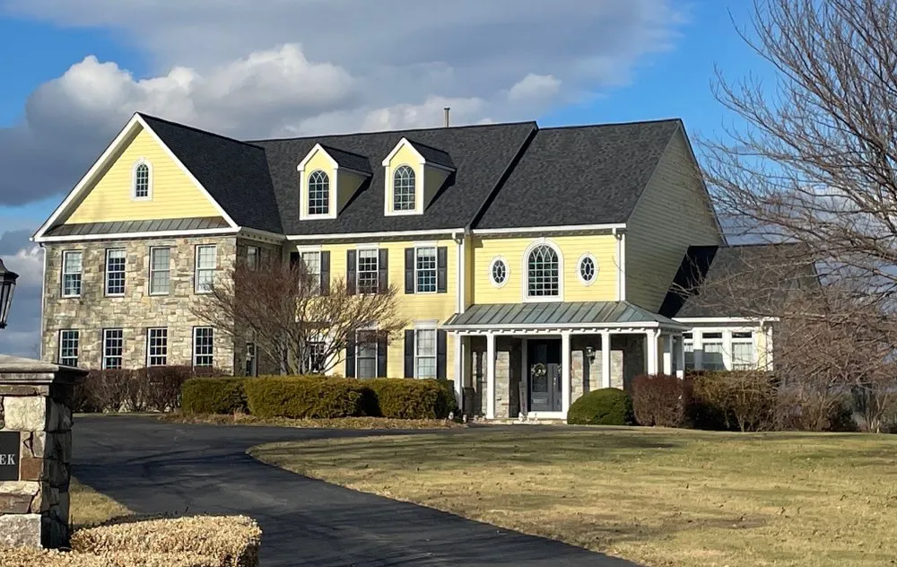 Slide of Pond Roofing Company