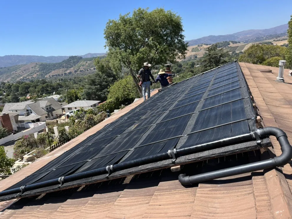 Slide of Pool Solar and Roofing