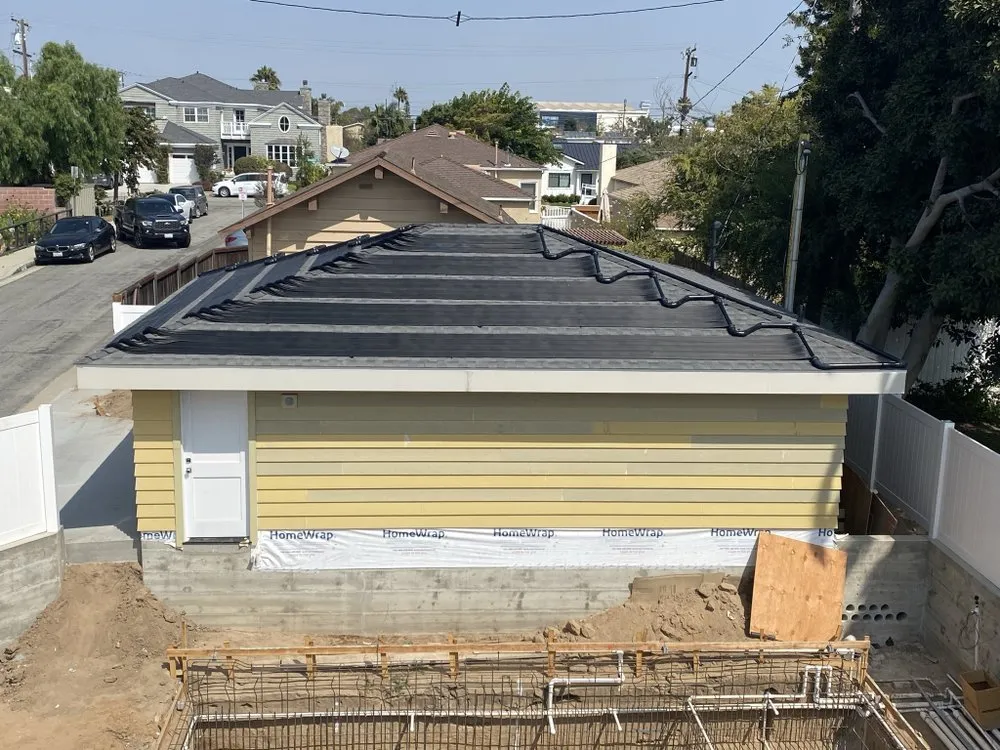 Slide of Pool Solar and Roofing