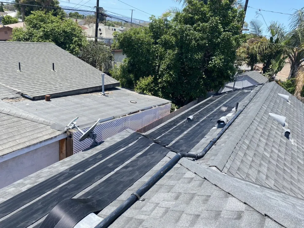 Slide of Pool Solar and Roofing