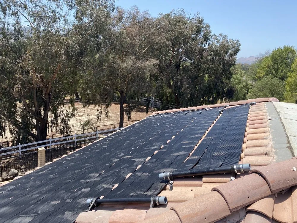 Slide of Pool Solar and Roofing