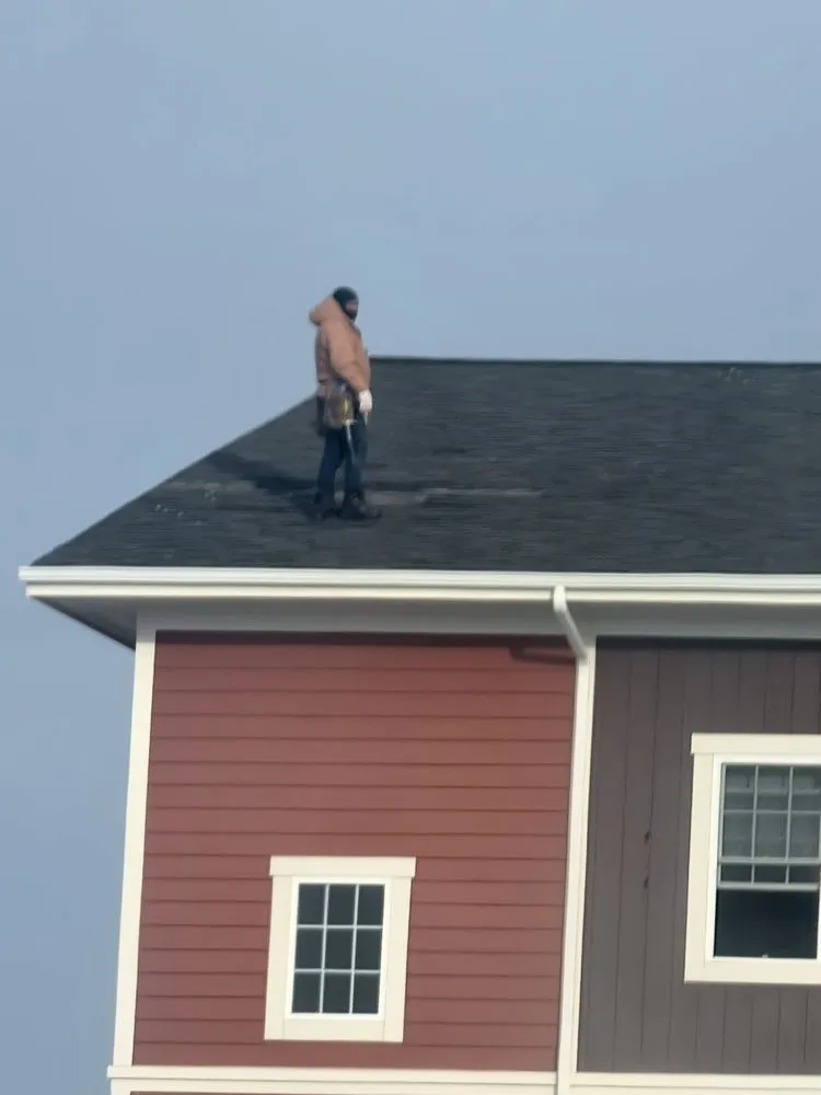 Slide of Poppe Roofing