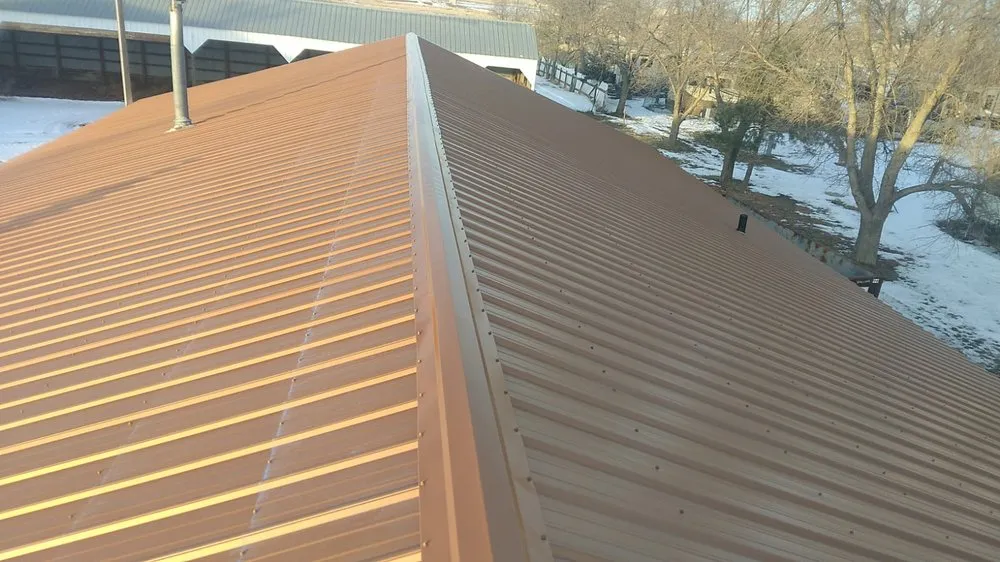 Slide of Poppe Roofing