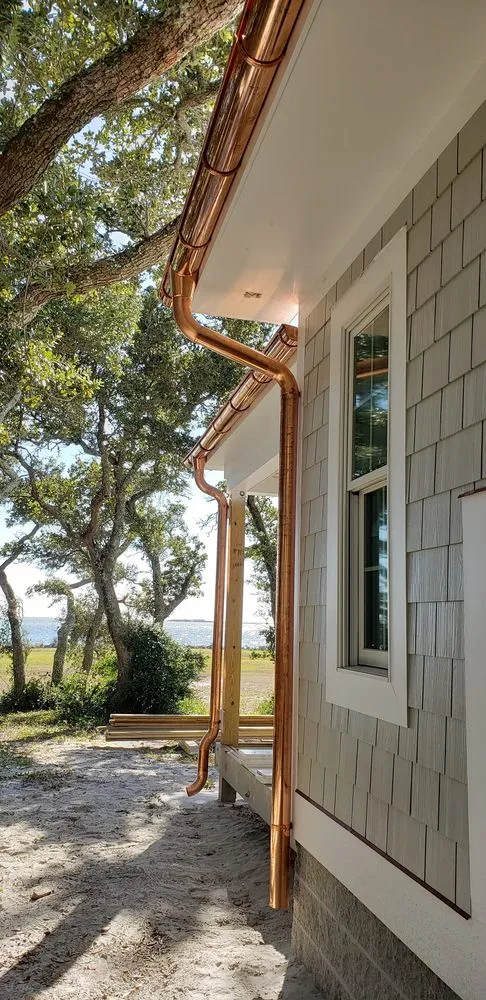 Slide of Port City Metal Roofing