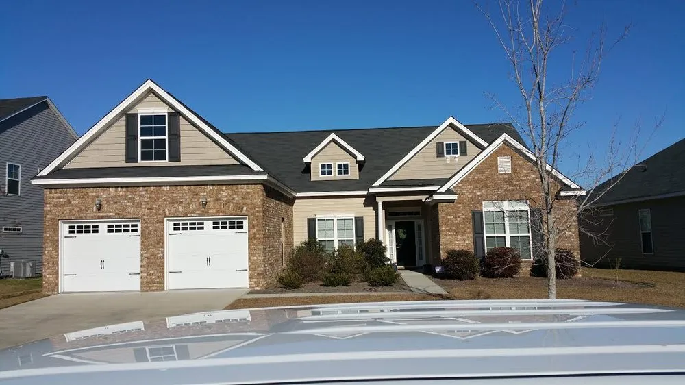 Slide of Port City Roofing